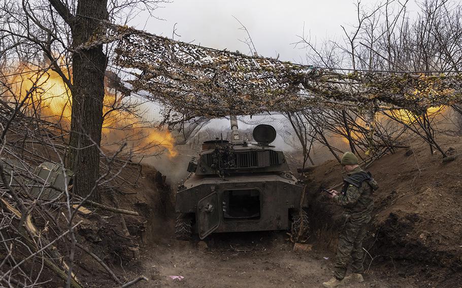 Ukrainian forces fire a 2S1 “Hvozdyka,” a Soviet-era 122mm self-propelled artillery installation, toward Russian positions. 