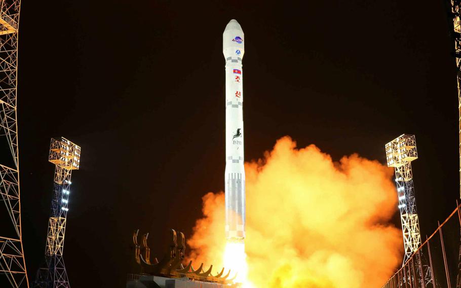 In this image released by the state-run Korean Central News Agency, North Korea launches its Chollima-1 rocket with a spy satellite aboard on Nov. 22.