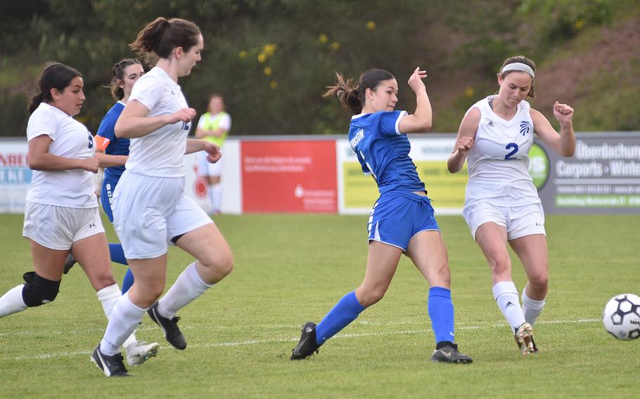 Ramstein's Ava Smith gets off a shot ahead of Wiesbaden's Alaura Stelker, right, during pool-play action on May 15, 2023, in Reichenbach-Steegen, Germany.
