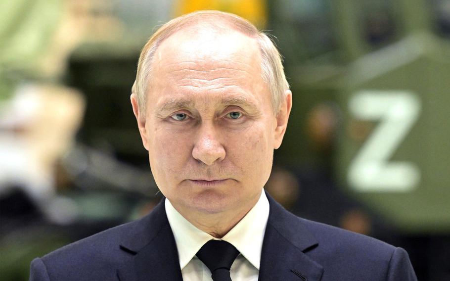 Russian President Vladimir Putin visits the Obukhov State Plant in St. Petersburg, Russia, on Jan. 18, 2023.