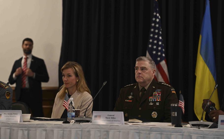 German lawmaker Siemtje Moeller, left, sits with U.S. Gen. Mark Milley, the chairman of the Joint Chiefs of Staff, during the Ukraine Defense Contact Group meeting Sept. 19, 2023, at Ramstein Air Base in Germany. Moeller is attending the talks in place of German Defense Minister Boris Pistorius, who is ill with the coronavirus.
