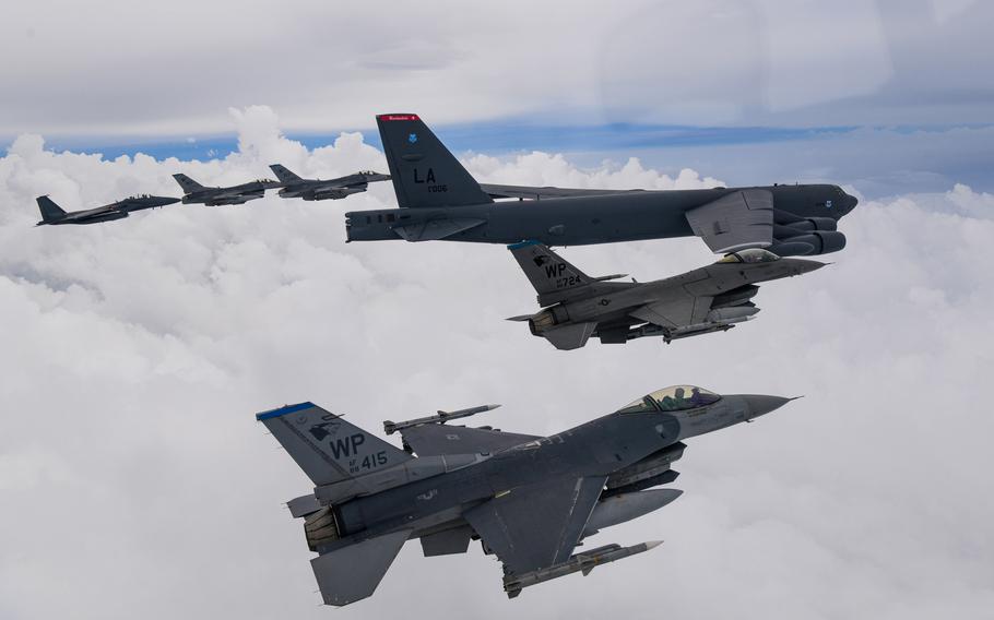U.S. F-16 Fighting Falcons and South Korean F-15K Slam Eagles escort a B-52H Stratofortress bomber over the Korean Peninsula, Thursday, July 13, 2023.