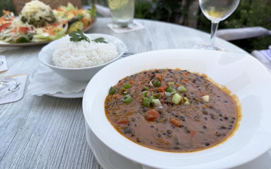 A dish of lentil and carrot curry.