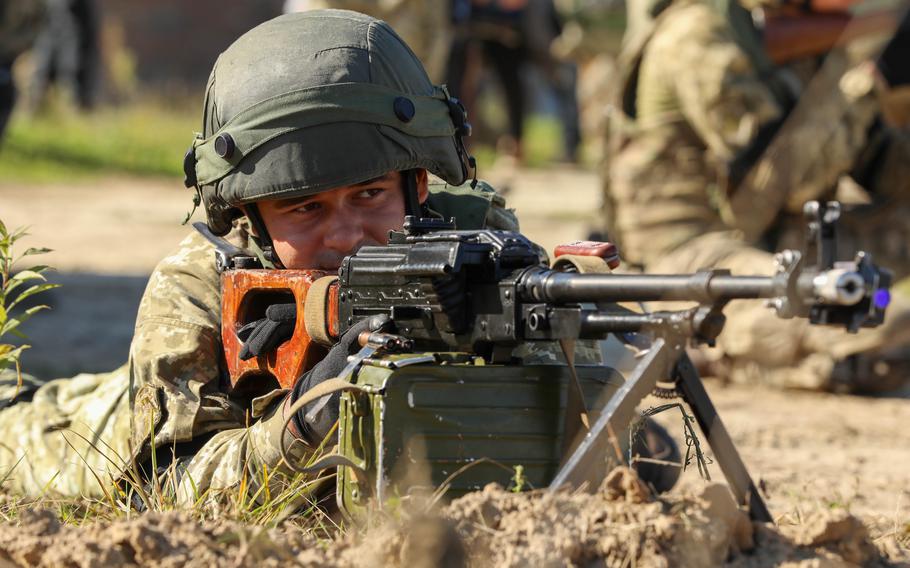 A Ukrainian soldier aims a machine gun during an anti-sabotage exercise near Yavoriv, Ukraine, Sept. 27, 2021. U.S. special operators remain in the country in an advisory training role, U.S. Special Operations Command Europe said Tuesday. 