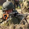 A Ukrainian soldier aims a machine gun during an anti-sabotage exercise near Yavoriv, Ukraine, Sept. 27, 2021. U.S. special operators remain in the country in an advisory role, U.S. Special Operations Command Europe said Tuesday. 