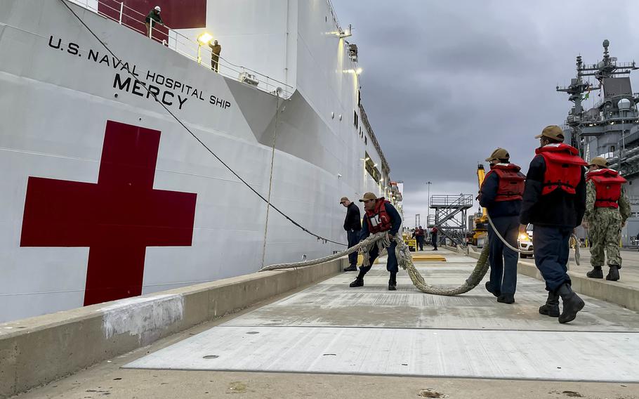 Sailors prepare the hospital ship USNS Mercy to depart San Diego for ths year’s Pacific Partnership mission, May 3, 2022. 