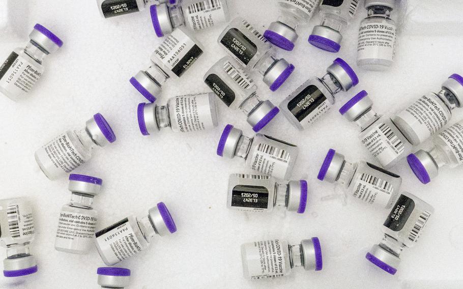 Vials of the Pfizer-BioNTech COVID-19 vaccine sit in a cooler before being thawed at a pop-up COVID-19 vaccination site in the Bronx borough of New York on Tuesday, Jan. 26, 2021.