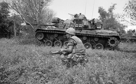 On May 16, 1967, Alpha Company of the 1st Battalion, 9th Marines, supported by tanks, moves out on a platoon-sized sweep. Attached by North Vietnamese Army troops, the marines suffered several casualties. 