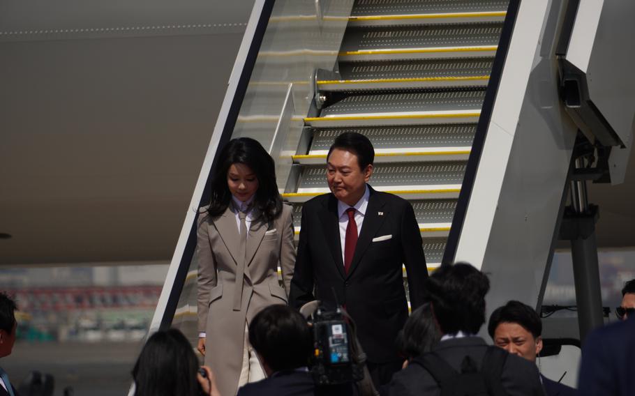 South Korean President Yoon Suk Yeol arrives at Haneda International Airport in Tokyo, Thursday, March 16, 2023. 