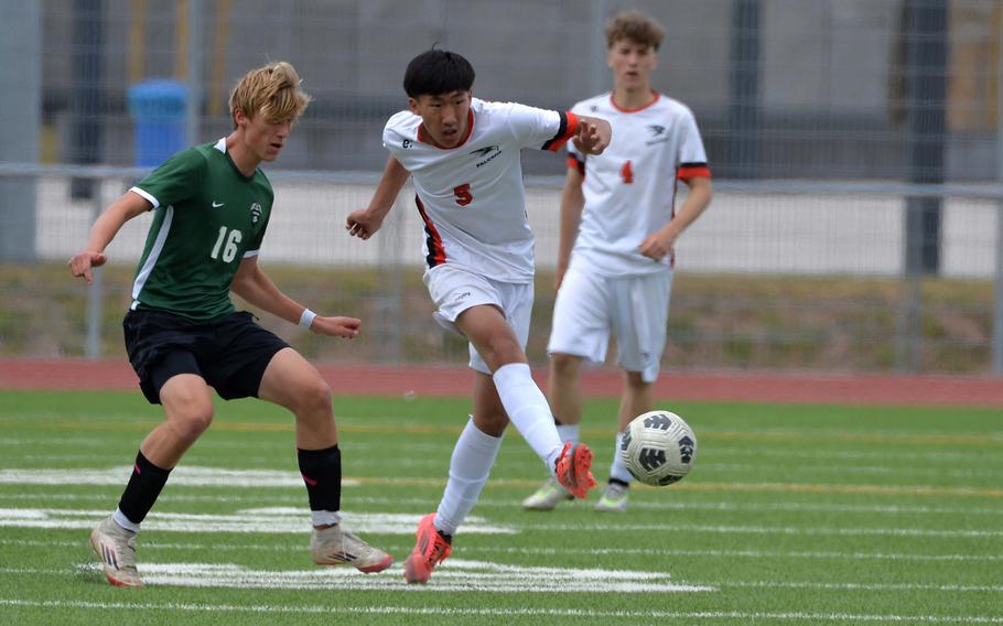 American Overseas School of Rome’s MengPeng Jian gets past Naples’ Colin McCord to take a shot on goal at the DODEA-Europe soccer championships in Ramstein, Germany, May 22, 2025. AOSR fell to Naples in the boys Division II title game 5-2.