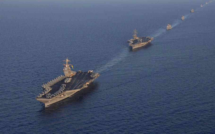 Aircraft carriers USS Gerald R. Ford and USS Dwight D. Eisenhower sail with other U.S. and allied ships sail in the Mediterranean Sea on Nov. 3, 2023. The carriers have flown more than 4,500 sorties since the start of Israel-Hamas war in October, the Navy said.