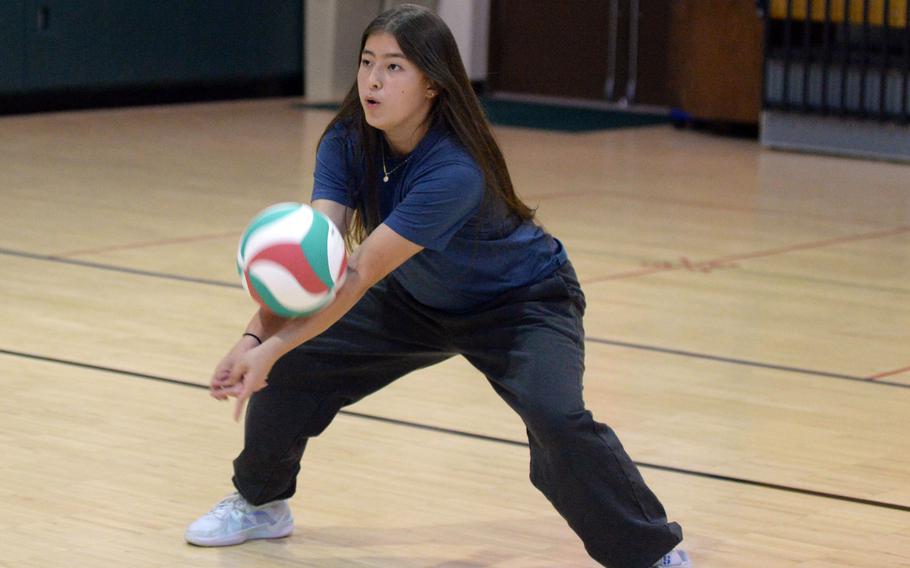 Denali Clites bumps the ball.