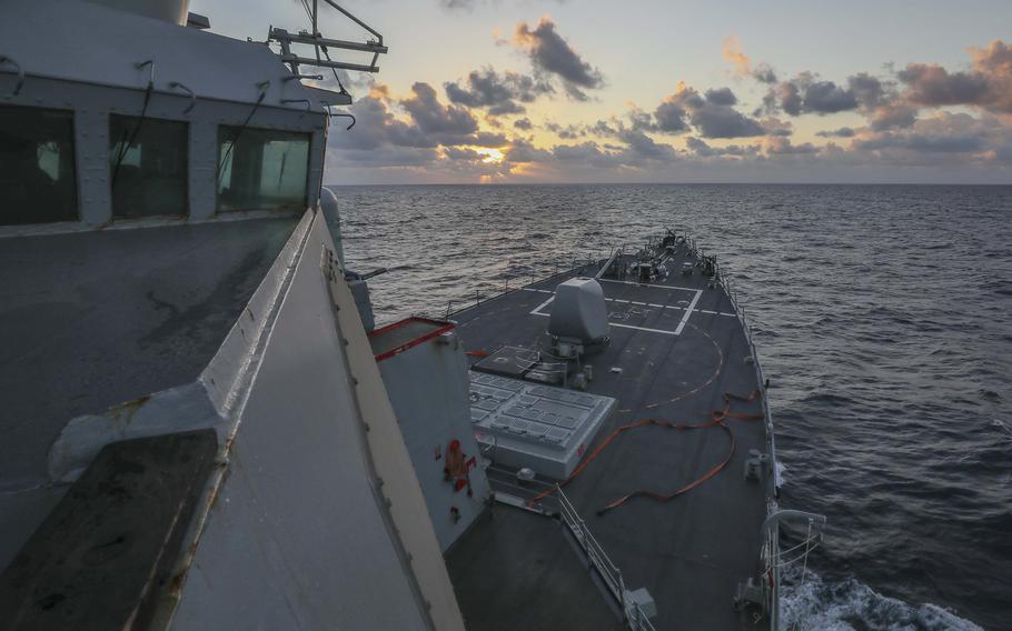 The guided-missile destroyer USS Benfold sailed near the Paracel Islands in the South China Sea, Thursday, Jan. 20, 2022. 
