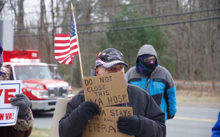 Dozens of elected officials, veterans and nurses turned out to protest the potential closure of a Veterans Affairs hospital in Northampton, Mass., on March 28, 2022.
