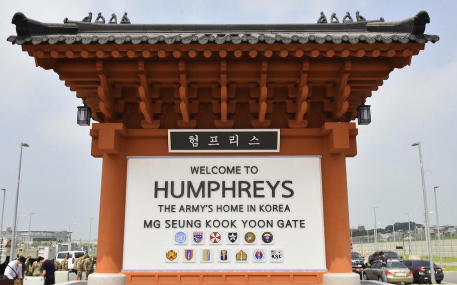 A sign shows the entrance to Camp Humphreys.