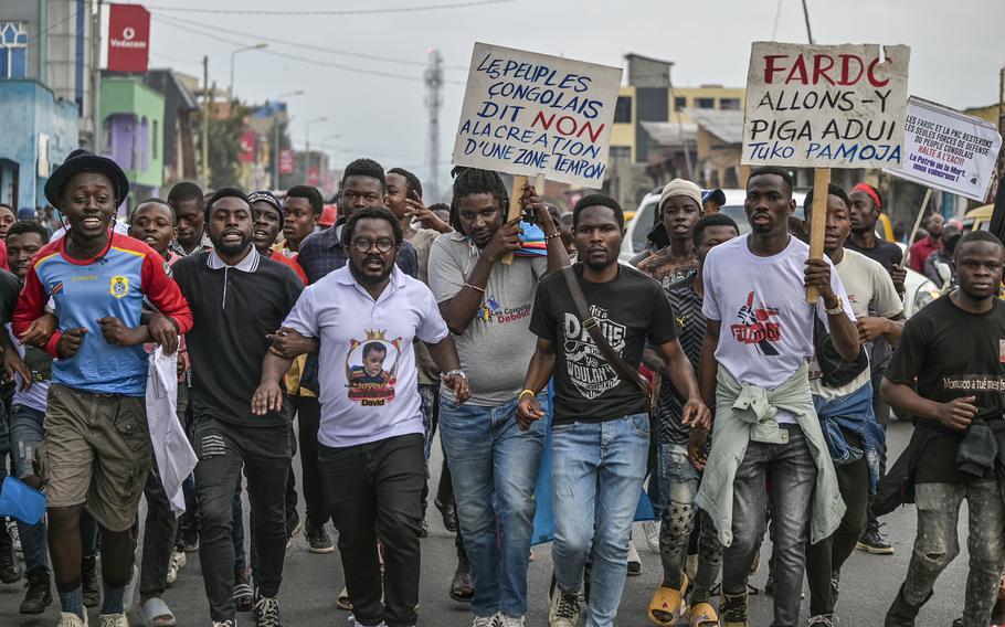 Residents of Goma, Democratic Republic of the Congo, demonstrate Wednesday Jan. 18, 2023, against the scheduled arrival of South Sudanese troops set to join Kenyan forces deployed to assist the Congo army in its fight against M23 rebels. 
