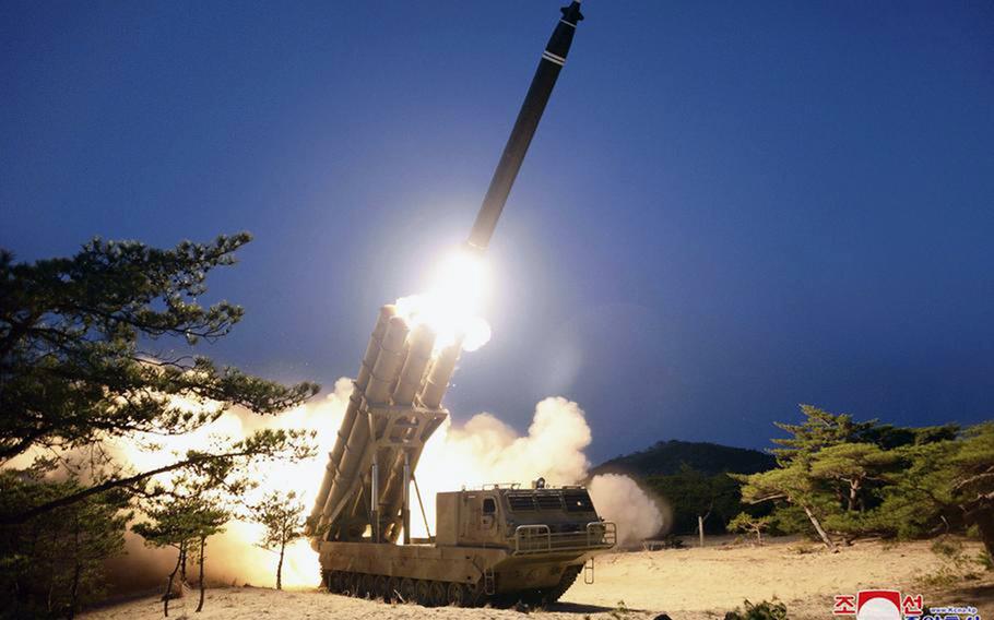 This photo from the state-run Korean Central News Agency shows a missile launch at an undisclosed location in North Korea, March 29, 2020. 