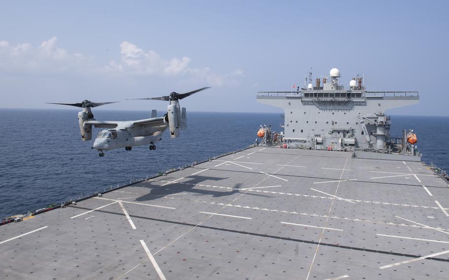 An Osprey assigned to Marine Medium Tiltrotor Squadron 161 lifts off from the Expeditionary Sea Base USS Hershel "Woody" Williams, Nov. 12, 2021. Marine Corps aircraft like Ospreys are part of a new approach to crisis response after the service quietly ended rotations of larger units that had begun in the wake of the 2012 attack in Benghazi, Libya.