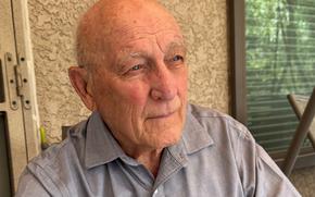 Retired Navy Capt. Mike McGrath, a Vietnam veteran who spent six years in captivity, seen here at his Colorado home on May 14, 2025. McGrath researched a spike in the number of veterans getting prisoner of war benefits from the Department of Veterans Affairs. He contends that the rise is a result of VA acceptance of claims from impostors, but the agency says its accounting system may create multiple tallies for a person who served during more than one wartime period.
