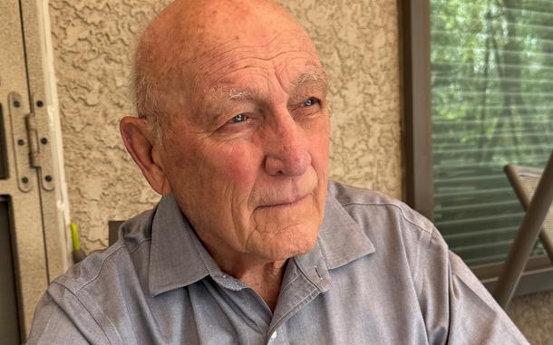 Retired Navy Capt. Mike McGrath, a Vietnam veteran who spent six years in captivity, seen here at his Colorado home on May 14, 2025. McGrath researched a spike in the number of veterans getting prisoner of war benefits from the Department of Veterans Affairs. He contends that the rise is a result of VA acceptance of claims from impostors, but the agency says its accounting system may create multiple tallies for a person who served during more than one wartime period.