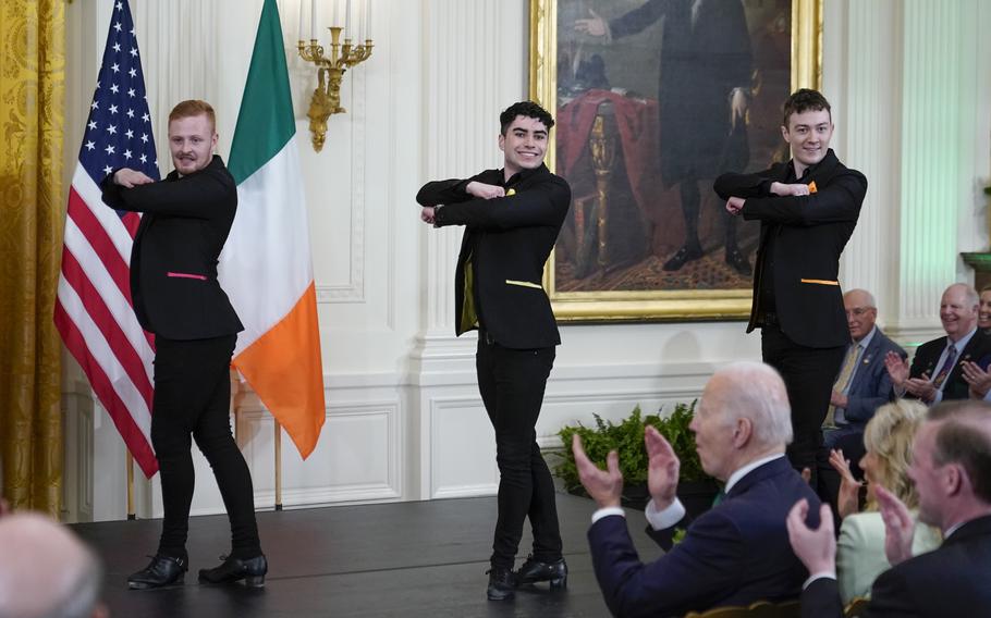 President Joe Biden and first lady Jill Biden watch Irish dance group Cairde perform at a St. Patrick's Day celebration in the East Room of the White House, March 17, 2022, in Washington. Biden is set to host Ireland's prime minister on Friday, March 17, 2023, after the pandemic scuttled the longstanding St. Patrick's Day meetup two years in a row.