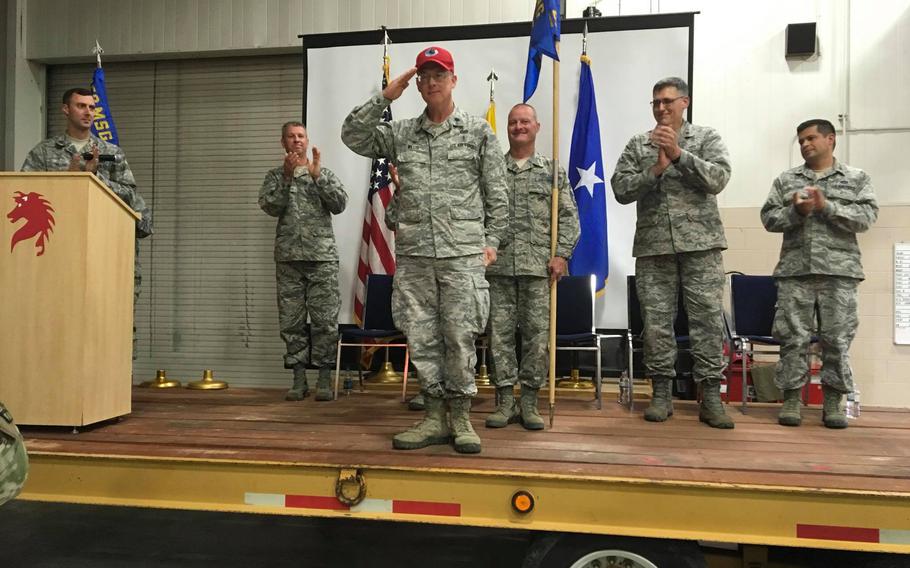 Lt. Col. James Willis salutes after taking command of the 210th Rapid Engineer Deployable Heavy Operational Repair Squadron Engineers (RED HORSE) Squadron on Nov. 3, 2018. Willis died Saturday in a noncombat incident in Qatar, the military said.