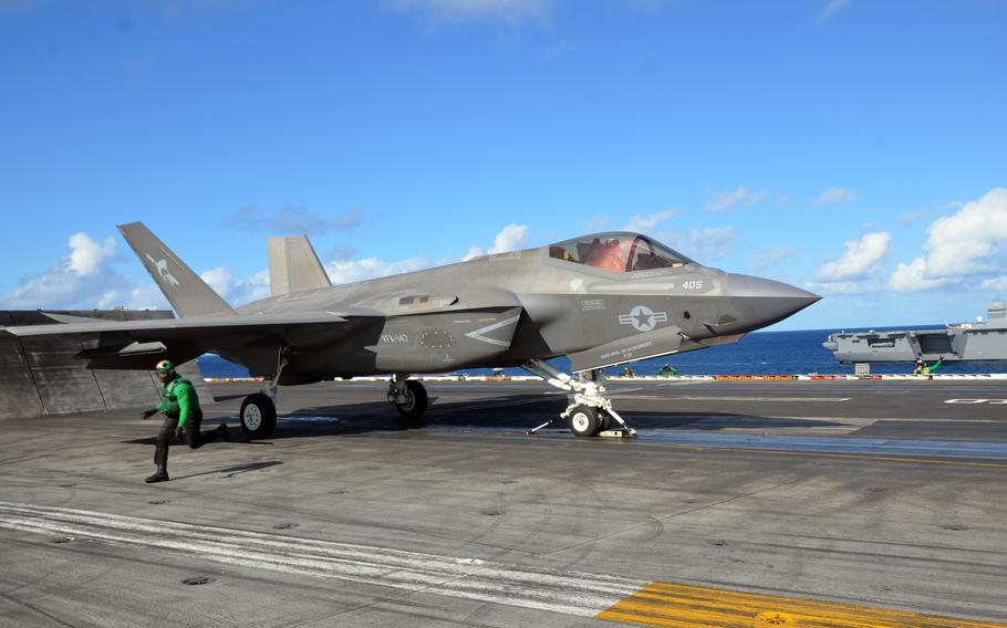 An F-35C Lightning II stealth fighter prepares for takeoff aboard the aircraft carrier USS Carl Vinson in the Philippine Sea, Tuesday, Nov. 30, 2021. 