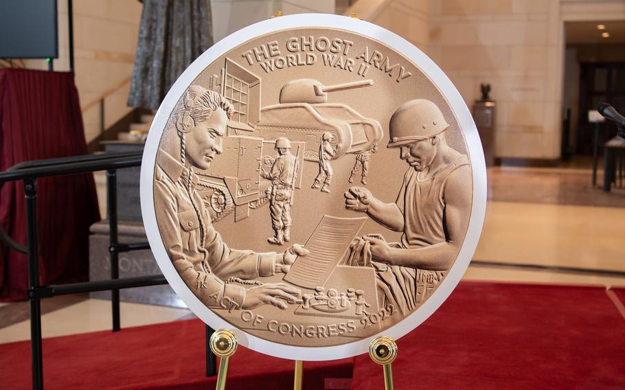 A replica of the Congressional Gold Medal is displayed at the U.S. Capitol in Washington, D.C., on March 21, 2024, during a ceremony to honor veterans who served with the World War II Ghost Army.