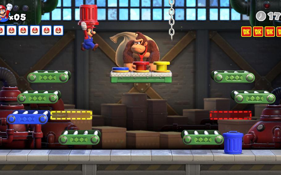Mario vs. Donkey Kong has more than 130 levels, including boss stages, like the one shown here, where Mario must defeat the big ape himself. The difficulty ramp-up is gradual, and nothing is too much of a problem until the fourth world, Merry Mini-Land.