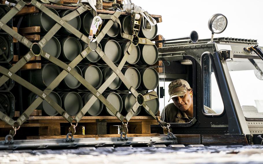Pallets of ammunition, weapons and other equipment are loaded and bound for Ukraine on a commercial airline at Dover Air Force Base in Dover, Del., on Oct. 12, 2022.