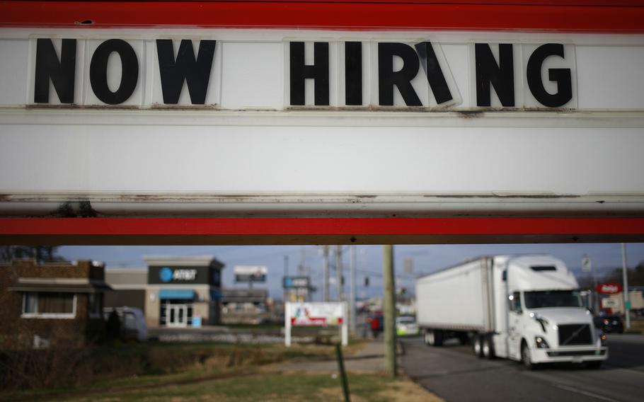 An employee recruitment sign outside a Marathon Petroleum Co. Speedway gas station in Seymour, Ind., on Monday, Dec. 6, 2021.