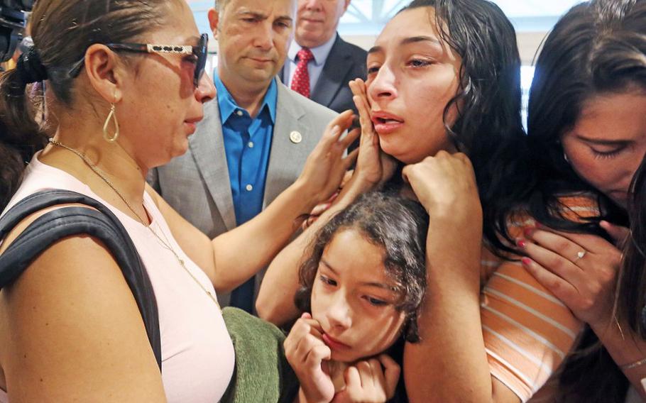  Alejandra Juarez, left, passes through TSA screening on Aug. 3, 2018, at the Orlando International Airport on her deportation flight to Mexico. 