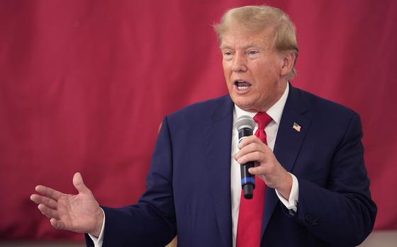 FILE - Republican presidential candidate and former President Donald Trump speaks to Texas state troopers and guardsmen at the South Texas International Airport, Sunday, Nov. 19, 2023, in Edinburg, Texas. A federal appeals court is hearing arguments Monday, Nov. 20, on whether to reinstate a gag order against Donald Trump in the federal case charging him with plotting to overturn the results of the 2020 presidential election. (AP Photo/Eric Gay, File)