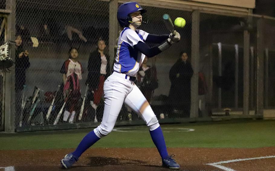 Molly Bogdan hits the ball.