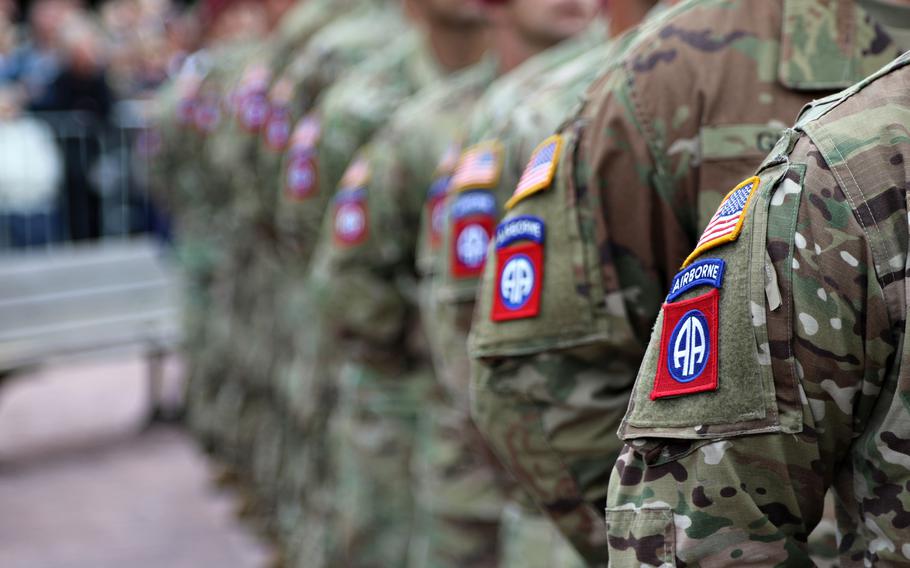 Paratroopers of the 82nd Airborne Division stand in formation in Sainte Mere Eglise, France, in 2019.