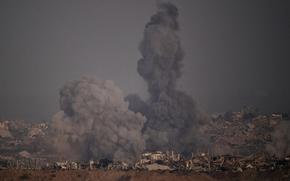 Smoke rises to the sky following an Israeli airstrike in the northern Gaza Strip as seen from southern Israel, Saturday, July 26, 2025. (AP Photo/Leo Correa)