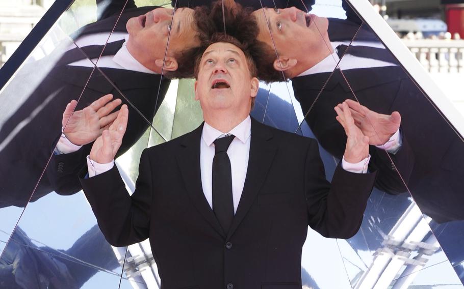 Director Sam Raimi poses for a photo during a photocall for Doctor Strange in the Multiverse of Madness, in Trafalgar Square, London, Tuesday April 26, 2022.