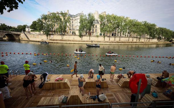 Swimmers cool off July 5 in the Seine river in Paris at the Bras Marie safe bathing site.