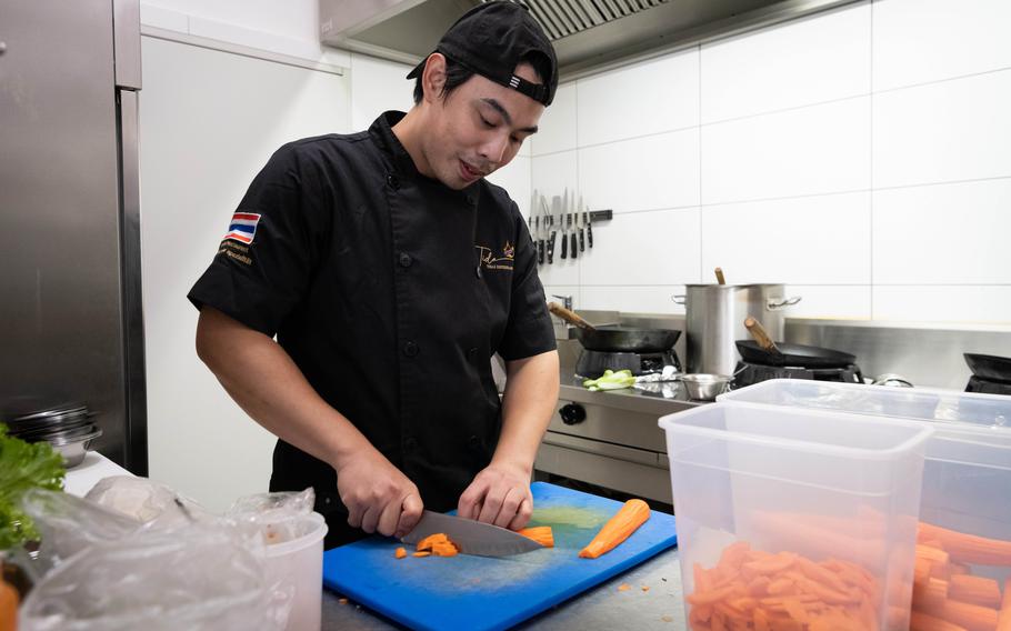 Tanakorn Sangkamanee prepares food at Tida Thai Restaurant in Kaiserslautern.