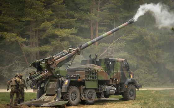 FILE - French soldiers fire a French-made CAESAR self-propelled howitzer during the Spring Storm 2023 military drills, the largest annual exercise of Estonian Defence Forces, near Tapa, Estonia on May 25, 2023. France will soon be able to deliver 78 Caesar howitzers to Ukraine and will boost its supply of shells to meet Kyiv's urgent needs for ammunition to fight Russia's two-year invasion, the defense minister said Tuesday. (AP Photo/Sergei Grits, file)