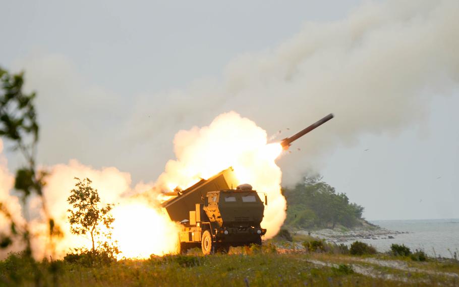 Flame roars out of the back as a rocket fires.
