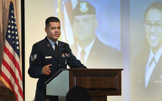 Wilmer Puello-Mota, a member of the 66th Security Forces Squadron, speaks during a gate dedication and renaming ceremony at Hanscom Air Force Base in Massachusetts, on Oct. 2, 2018. Puello-Mota, a U.S. Air Force veteran and former elected official in Massachusetts who fled the U.S. after being charged with possessing sexually explicit images of a child, told his lawyer he joined Russia’s army, and video appears to show him signing documents in a military enlistment office in Siberia, Russia.