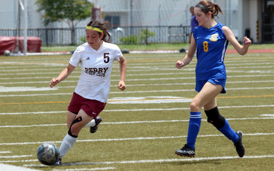 Perry's Priscilla Ramirez and Yokota's Gabi Burgoyne chase the ball.