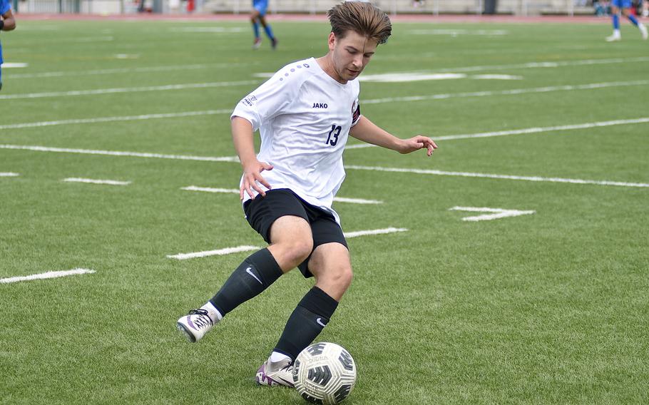 Kaiserslautern outside midfielder Nico Engeman stops the ball from going out during a Division I semifinal match against Ramstein at the 2025 DODEA European championships on May 21, 2025, at Kaiserslautern High School in Kaiserslautern, Germany.