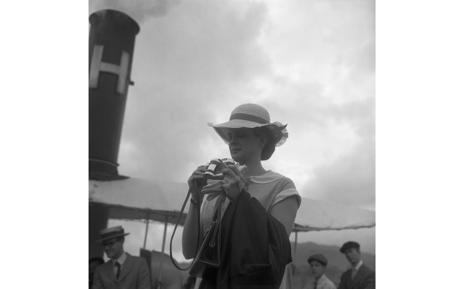 Candice Bergen taking pictures on “The Sand Pebbles” film set in the Port of Keelung, Taiwan, on Nov. 29, 1965.