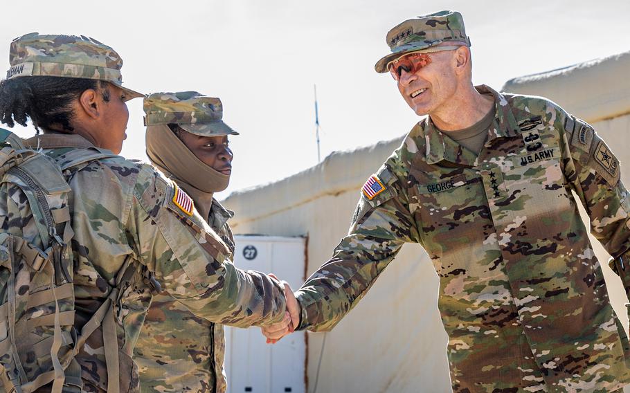 Soldiers assigned to the 1st Cavalry Division meet Gen. Randy George, vice chief of staff of the Army, on Nov. 4, 2022, at Fort Irwin, Calif. George has been nominated to replace Gen. James McConville as the Army's top officer.