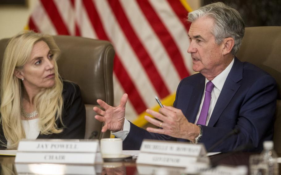 Jerome Powell, chairman of the U.S. Federal Reserve, speaks while Lael Brainard, the president's pick to replace vice chair Richard Clarida, listens during an event at the Federal Reserve in Washington on Oct. 4, 2019. 