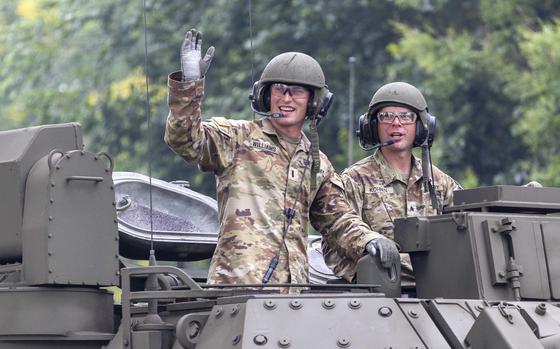 Soldiers in a tank wave to the crowd on Saturday, June 14, 2025, during the U.S. ArmyÕs 250th anniversary parade and celebration in Washington. (Eric Kayne/Stars and Stripes)