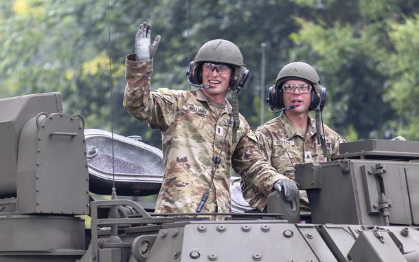 Soldiers in a tank wave to the crowd on Saturday, June 14, 2025, during the U.S. ArmyÕs 250th anniversary parade and celebration in Washington. (Eric Kayne/Stars and Stripes)