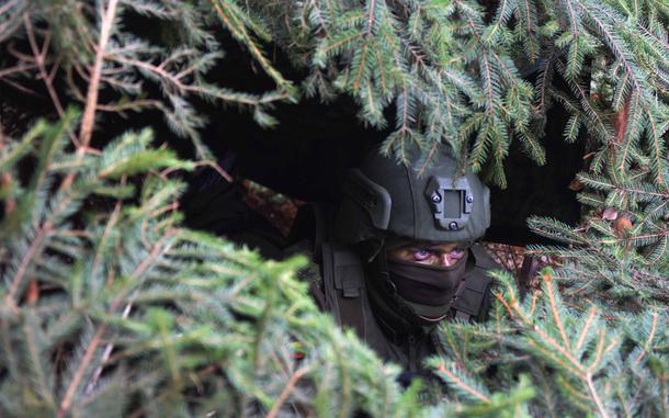 Hed: Operation Dynamic Front, 2017

Grafenwoehr, Germany, Mar. 8, 2017: A Lithuanian soldier observes artillery fire from inside a camouflaged enclosure during Operation Dynamic Front. 

More than 1,300 soldiers from nine NATO countries participate in the Feb. 26 through Mar. 9, 2017 training to ensure that when two or more countries' forces work together, their artillery and communication is synchronized for maximum impact and avoidance of what could be catastrophic friendly fire. 

Read more at: https://www.stripes.com/news/2019-03-07/europes-largest-annual-us-led-artillery-exercise-underway-in-germany-1489099.html1
Source - Stars and Stripes

Read Stars and Stripes' coverage of the exercise here. [https://www.stripes.com/news/2017-03-09/nato-forces-harmonize-the-big-guns-1532059.html1]

META TAGS: NATO; multi-national exercise; training; artillery; U.S. Army; USAREUR;